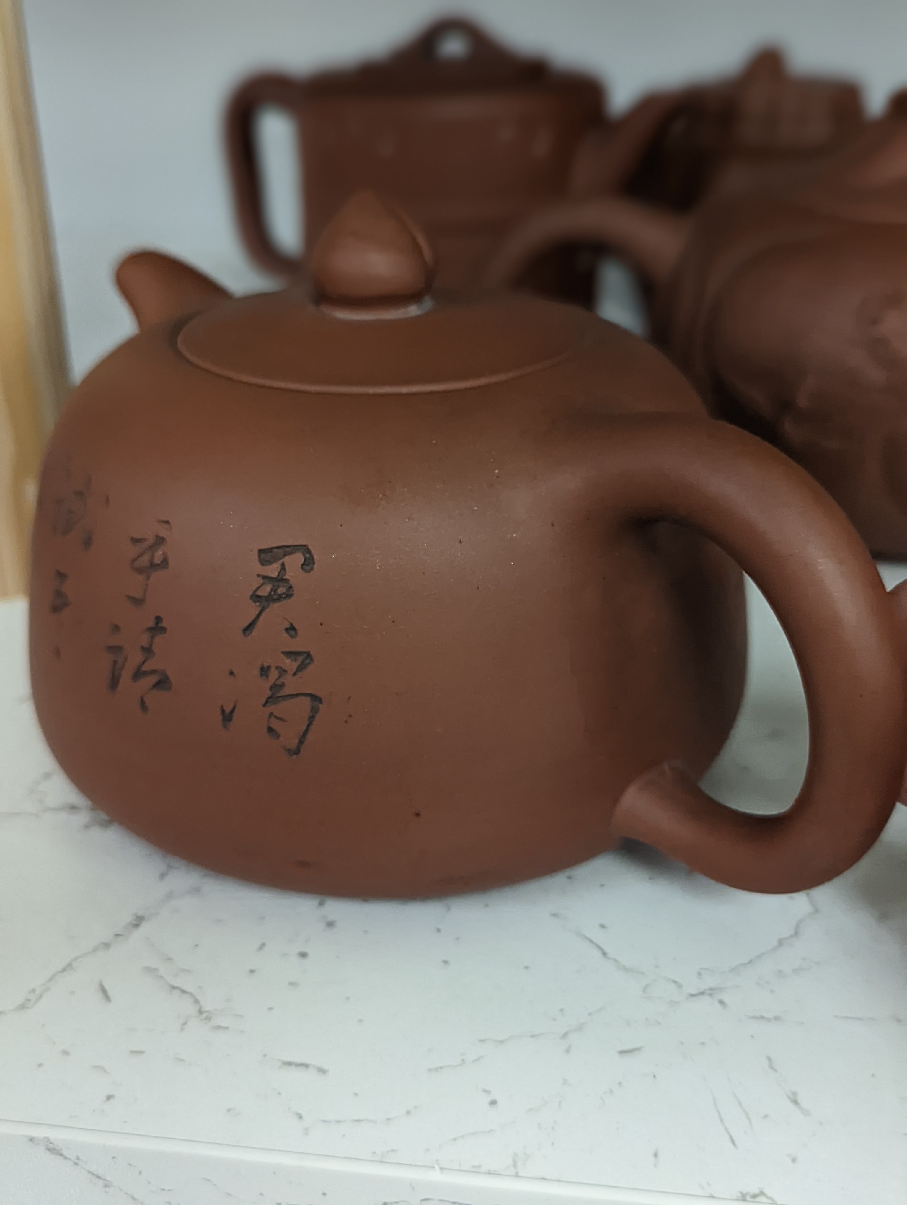 Six Chinese Yixing teapots, tallest 11cm